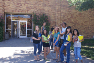Group of female students outside school.