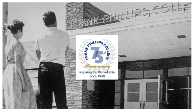 A man standing in front of a building with the words " frank phillips college 7 5 th anniversary ".